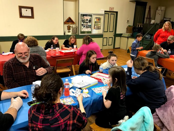 people play board games together