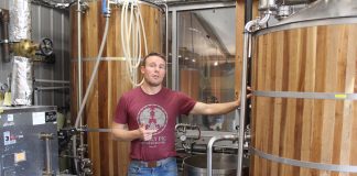guy standing in brewery
