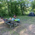 How to plan a summer camping trip Vayda at a campsite