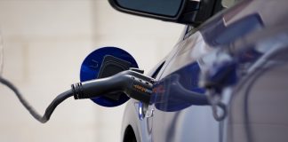 Pa. celebrates 1,000 electric vehicle chargers installed charger in a car