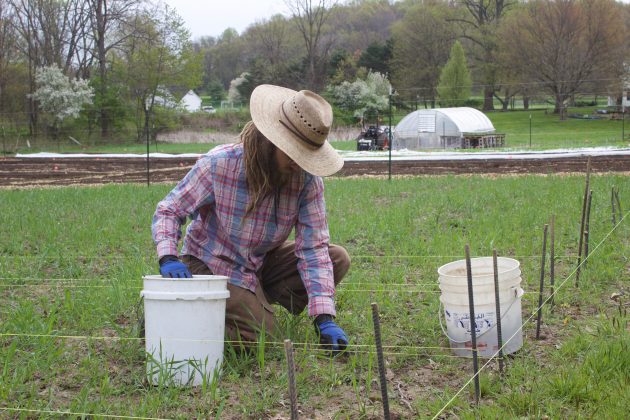 A farmer working on a field.
