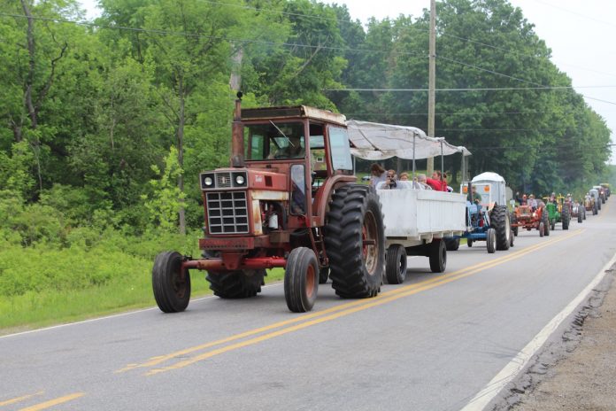 moraine-tractor-cruise-2 tractors cruising down the road