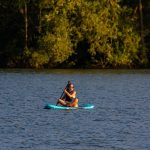Enjoying all that returning home has to offer paddle board