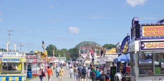 2022 Ohio agricultural fair schedule Fairgoers walk around at the Canfield Fair.