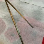 Can you name the intricate brass tool?