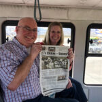 Visiting Cabo San Lucas with the Weavers Lance and Jaimye Weaver hold the Farm and Dairy on the bus in Cabo San Lucas, Mexico
