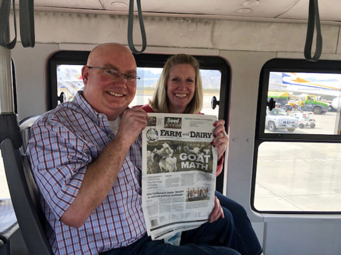 Lance and Jaimye Weaver hold the Farm and Dairy on the bus in Cabo San Lucas, Mexico
