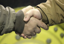 Father teaches that loyalty runs deeper than simple honesty handshake