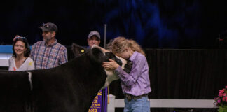 Ohio State Fair Sale of Champions breaks all records Ryleigh Egbert and her Grand Champion Market Beef Steer