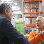 Ohio organizations talk food access, 2023 Farm Bill a man and a woman talk at a foodbank