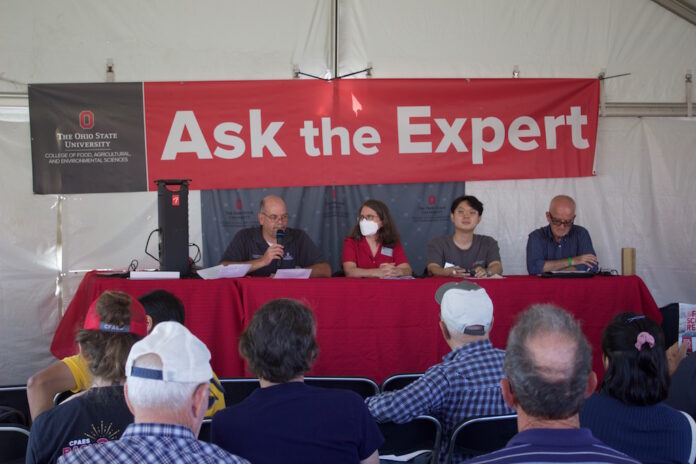 fsr_friday_ave_talk four people speak from a stage