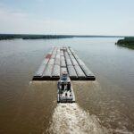 Still sorting out effects of reports, wars and weather barge on the Mississippi River