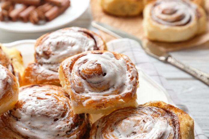 Sweet cinnamon rolls on plate