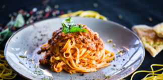 delicious italian spaghetti bolognese with minced beef sauce, to