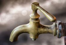 Conserving water helps home sewage treatment systems last faucet
