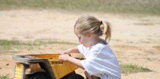 A little dirt can’t hurt child playing in dirt