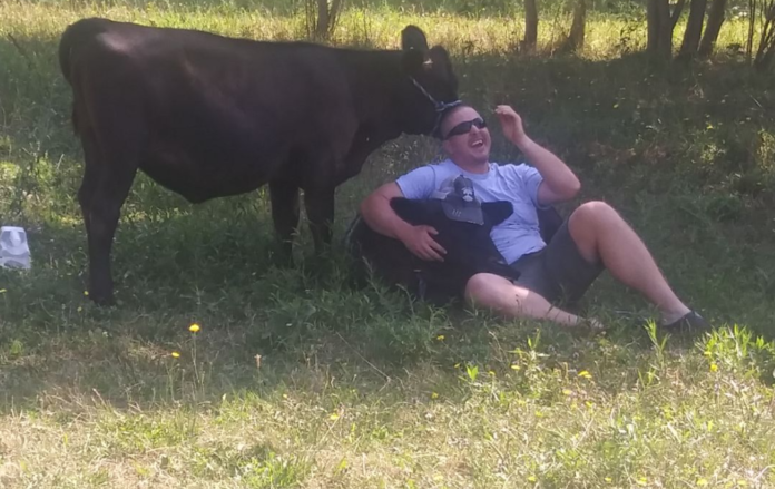 Eric Keller with cattle Eric Keller with cattle