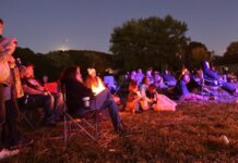 The Pig Lady and other folk tales show why recording stories matters people sit in lawn chairs and on the ground, bathed in light from campfires