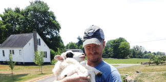 Eric Keller and a sheep