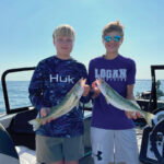 Hatch results released for Lake Erie walleye, yellow perch two boys with fish