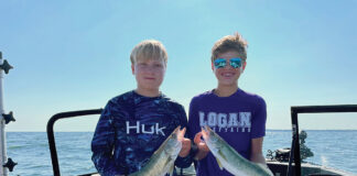 Hatch results released for Lake Erie walleye, yellow perch two boys with fish