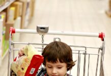 Tantrum child in a shopping cart