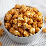 Homemade Caramel Popcorn in a gray Bowl, low angle view.