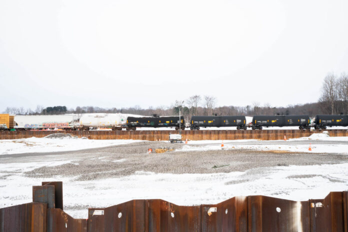 train through remediation site Norfolk Southern