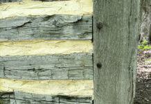 Many arms (and legs) were required at a house raising log construction