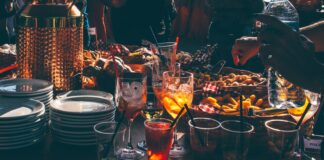 person trying to pick fried food