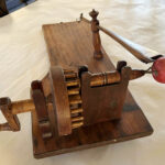 With apple butter parties, play preceded the work mechanical wooden apple peeler