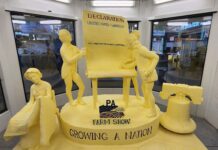 The 2026 Pennsylvania Farm Show Butter Sculpture celebrates Founding Fathers
